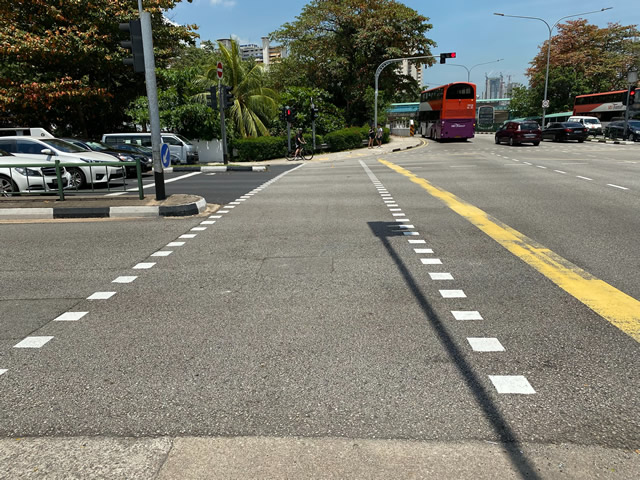 After crossing the first pedestrian crossing, turn to your right and cross that pedestrian crossing as well